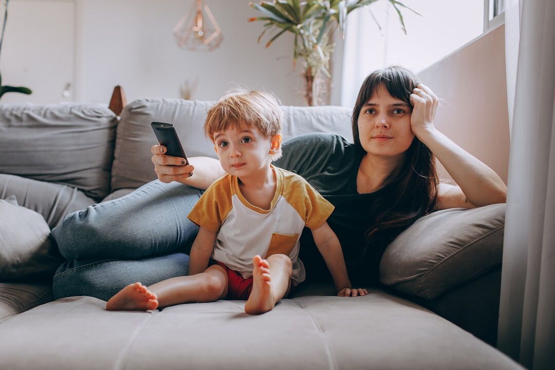 family watching news on tv