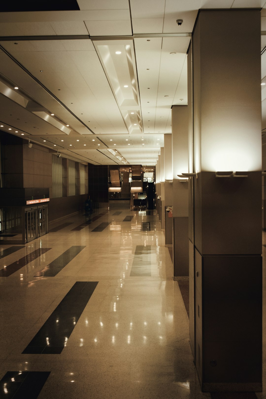 Bright modern editorial office with desks and large windows